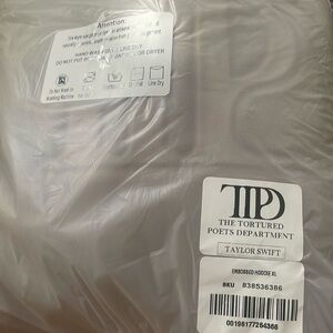Taylor Swift TTPD XL Embossed Hoodie -authentic new in open package. Never worn